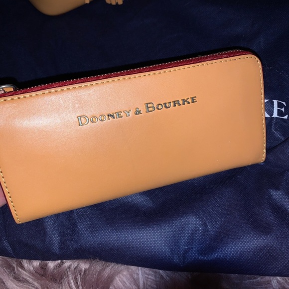 Dooney bucket purse with matching wallet - Picture 3 of 5